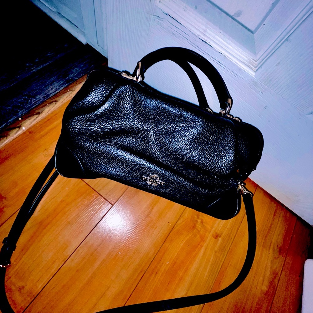 Black, leather authentic $500 Coach purse.